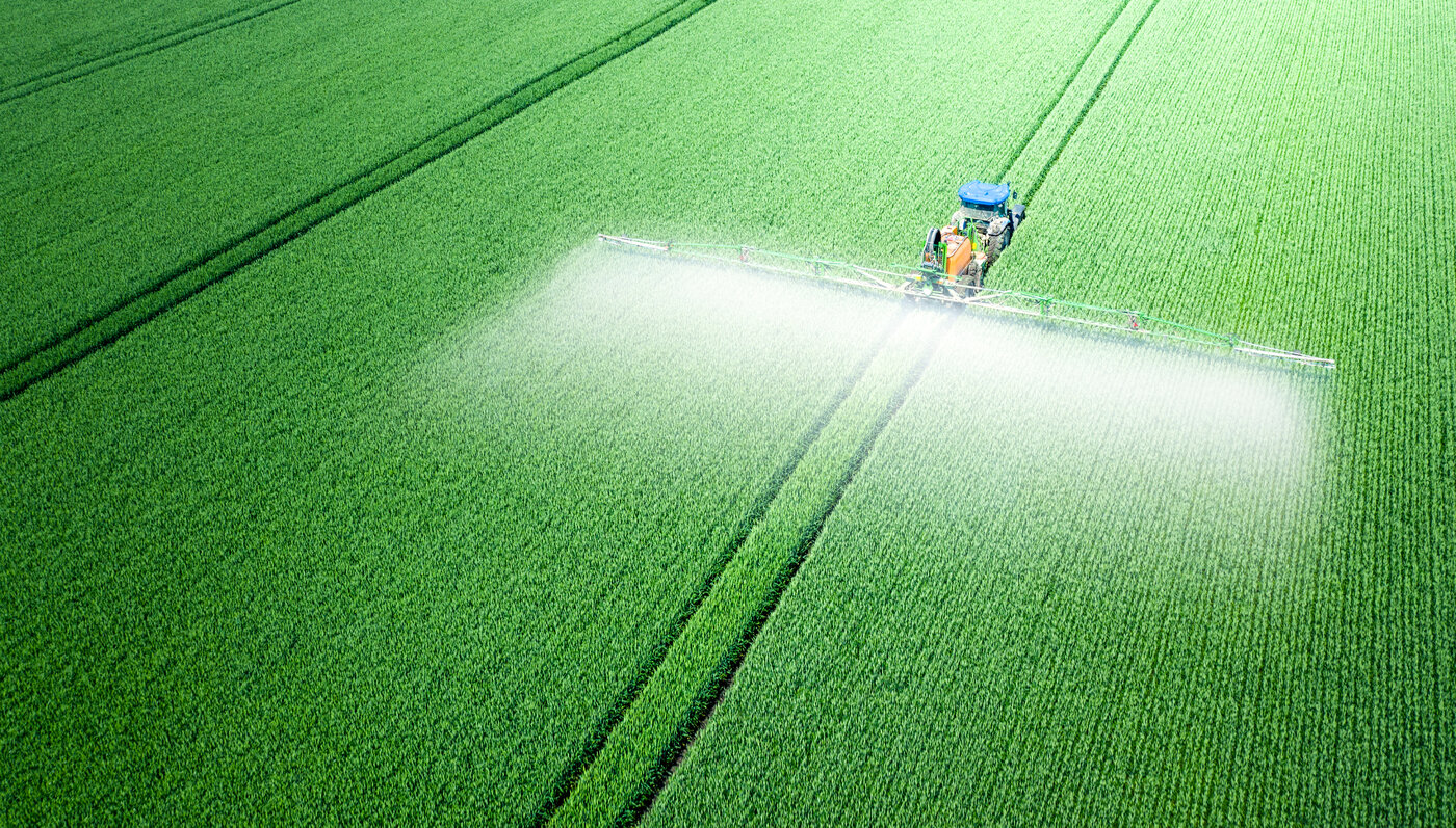 Chemicals being sprayed onto crop